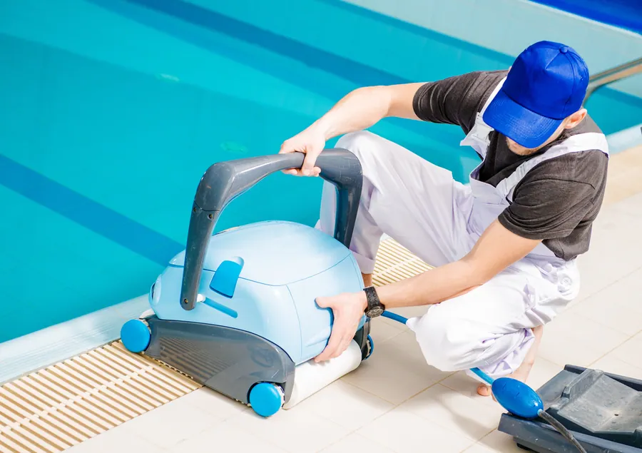 Illustrative image of pool maintenance, not necessarily taken in this town.
